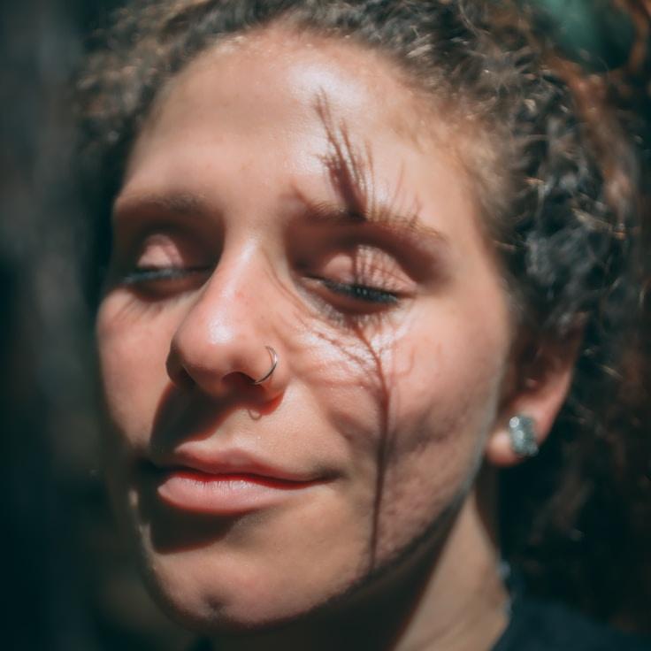 Kaveri Mehta, Lead Design Curator at Fores Llinen Market, reviewing corporate floral arrangements